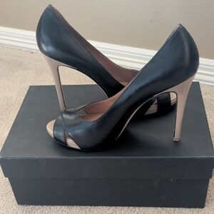 Chic Black and Tan Peep-Toe Heels